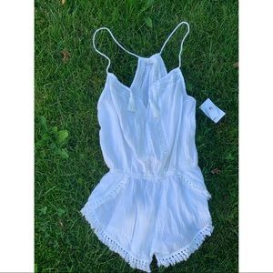 Ripcurl white romper. Size medium. Never worn.